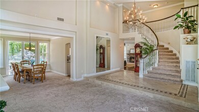 Living Room with Spiral Staircase