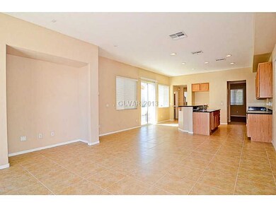 Property Photo. Family Room looking into Kichen