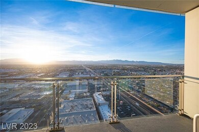 Balcony featuring a view of city and a mountain vi