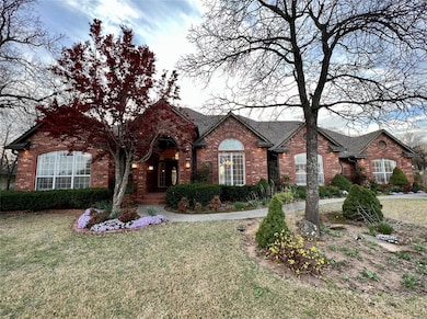 Single story home with a shingled roof, a front la