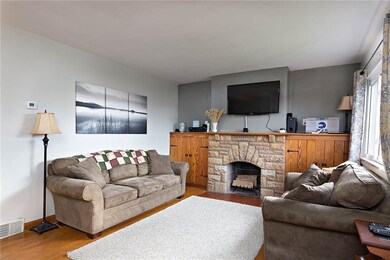 Spacious Living Room with Wood Burning Fireplace, 