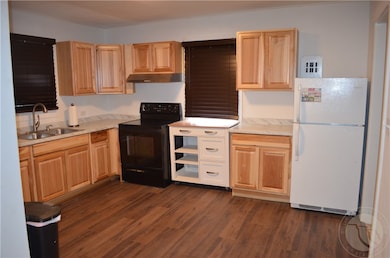 Newly remodeled kitchen with new flooring & counte