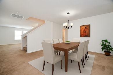 Plenty of ways to make this space your own. (Another view of the dining room virtually staged with A.I.)