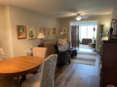 Beautiful living area that opens into the sunroom.