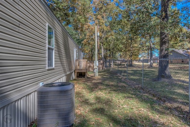 View of yard featuring a wooden deck