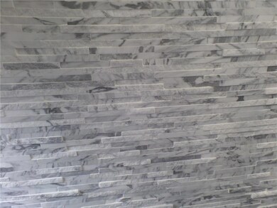 Gorgeous Carrera Marble Backsplash in Kitchen