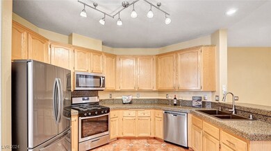 Large kitchen with stainless steel appliances