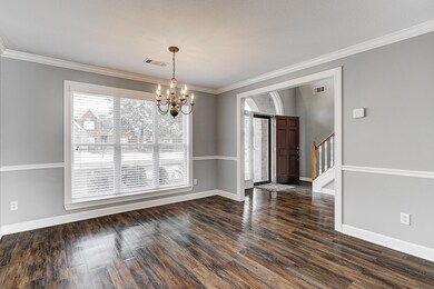 Unfurnished dining area with dark wood-type floori