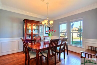 Formal Dining at the front of the house with crown