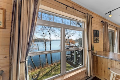 View from kitchen window down Sand Lake