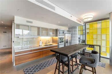 Kitchen with built in appliances, brown cabinetry,