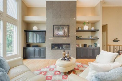 Floor to Ceiling fireplace adds a modern touch.