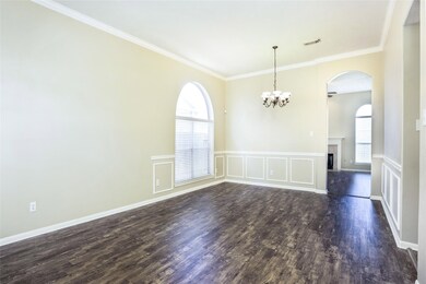 Gorgeous vinyl plank flooring and updated lighting. Chair rails in dining area.