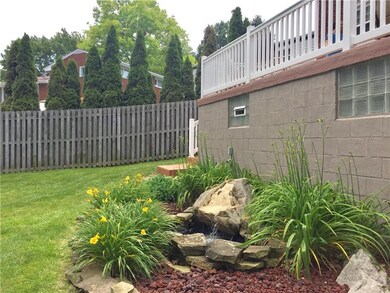 Water feature near attached garage.