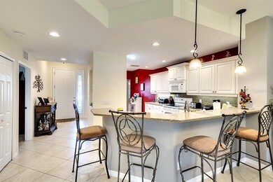 Beautiful kitchen with granite and bar 