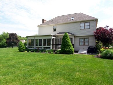 Beautiful screened in sun room & deck.