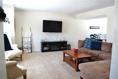 Living room with a view from the foyer!
