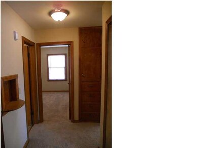 Hallway with linen closet