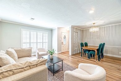 A spacious living area with plenty of natural ligh