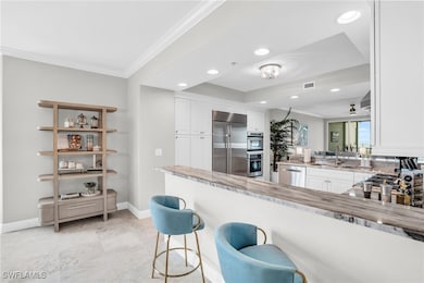 Grande Geneza at the Grande Preserve unit 1404, Naples, FL 34110 - photo 3