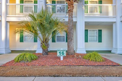 Entrance to property with a balcony