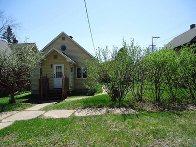 View of front of property with a front lawn