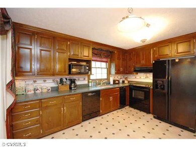 Kitchen - Larger than it looks in picture.  Opens 