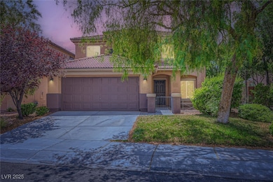 View of front of property featuring a tiled roof,