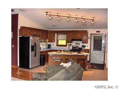Kitchen. Kitchen.  Note the island with the sink a