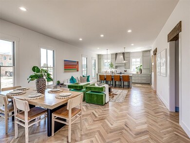 Dining room featuring light parquet flooring