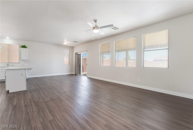 Unfurnished living room with ceiling fan, healthy