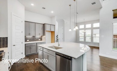 Kitchen featuring stainless steel dishwasher, a ki