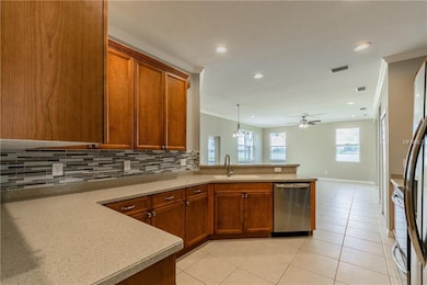 Kitchen view over looking the Family room with a g