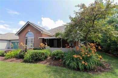 ENJOY THE GARDENS FROM THE FRONT PORCH WHICH IS CO