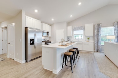 Make this amazing Cameron II Floorplan your new home!  Beautiful kitchen with large center island and nice pantry for storage. Photo of Model Home. Options and colors may vary.