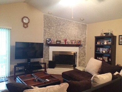 Great Room with corner fireplace/vaulted ceilings