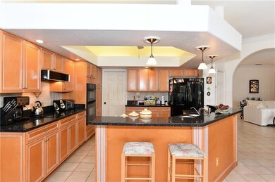 Kitchen opening to family room