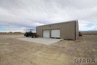 4 car shop has woodstove and evaporative cooler