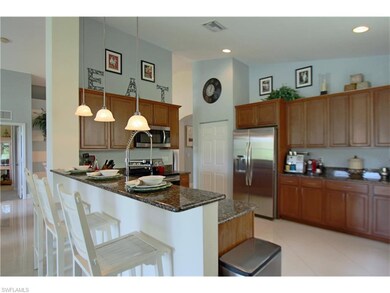 Kitchen & Bar is open to Living and Dining Areas