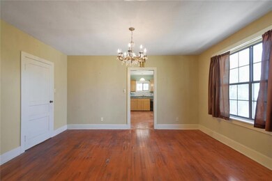Formal dining room leads to kitchen.  Also has sto