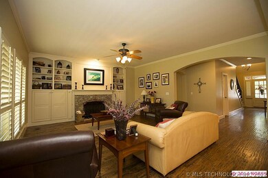The wood floors flow throughout the main level of