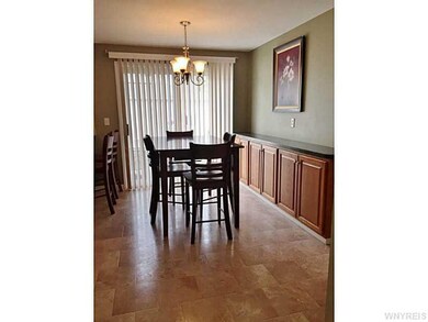 Dining Room. The built-in cabinet adds practical s