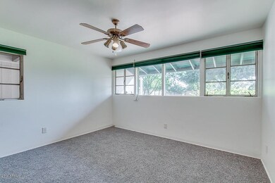 7. MASTER BEDROOM WITH VIEWS OF LARGE BA
