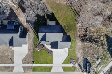 1449 Chase Farms Dr unit 22, Byron Center, MI 49315 - photo 5