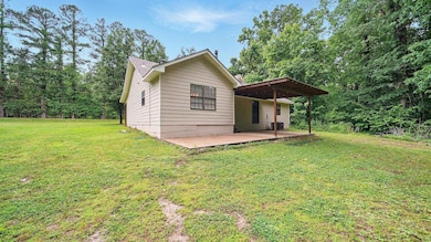 View of home's exterior featuring a patio area