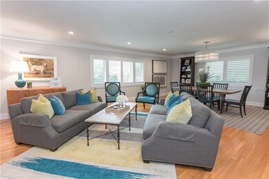Wood floors, plantation shutters and crown molding