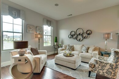 Make memories in your beautiful Great Room! Photo is an example of builder's work. Actual home built may vary.