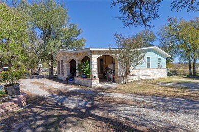 View of front of property with stone siding