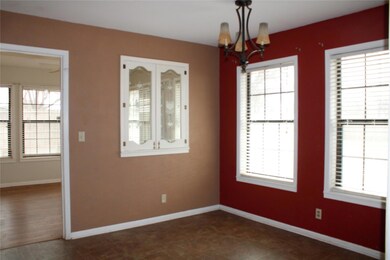 Spare room with a notable chandelier, plenty of na