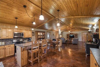 Kitchen looking into dining and living area
